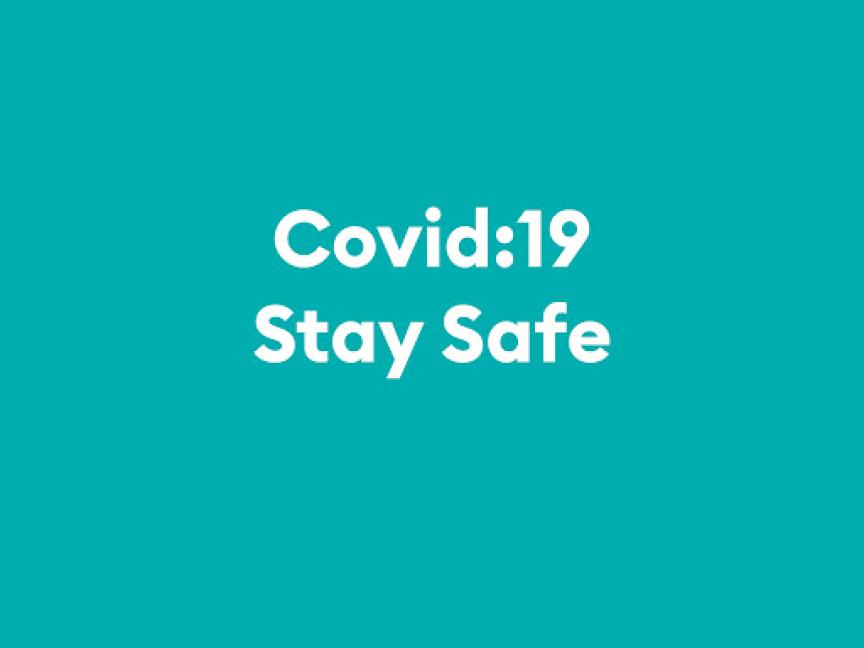 White Text, Covid 19 Stay Safe on Blue Background 